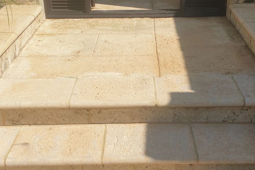 Before and after cleaning on liquid limestone: after