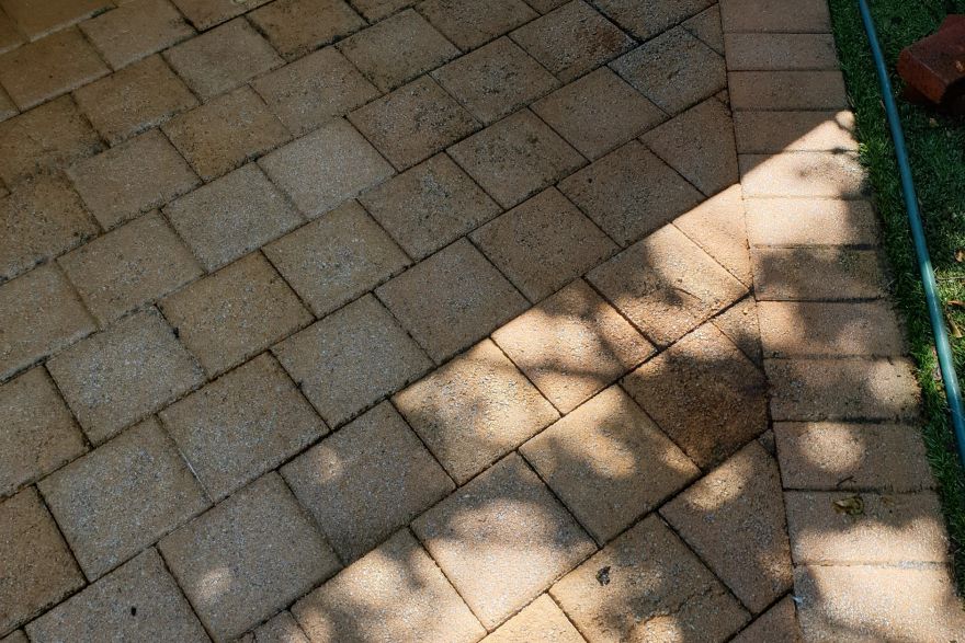 Before and after cleaning on brick pavers: after