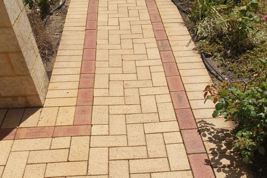 Before and after cleaning on brick pavers: after