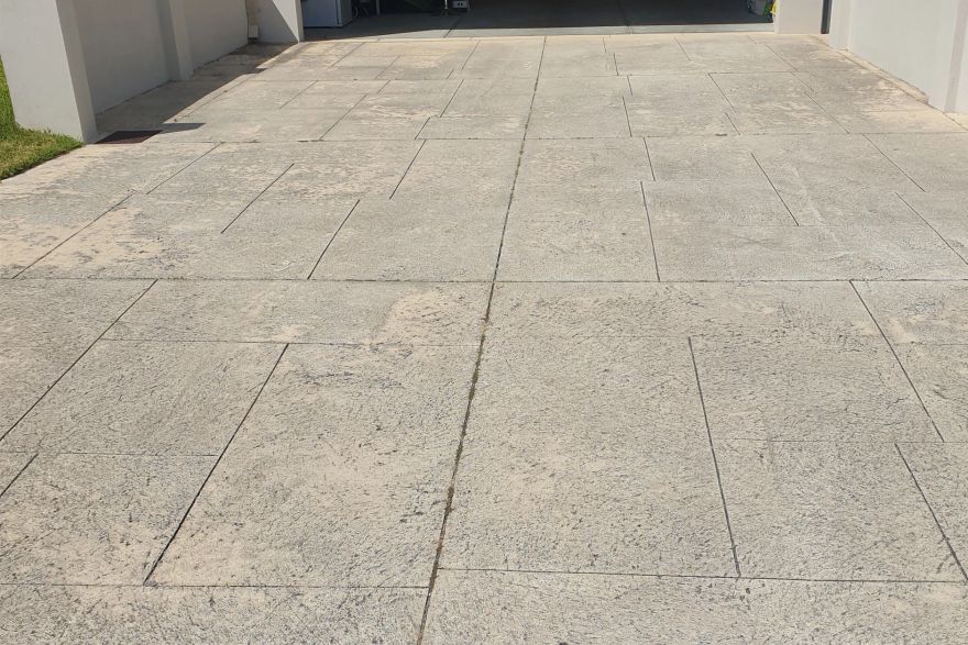 Before and after cleaning on liquid limestone · Driveway: before