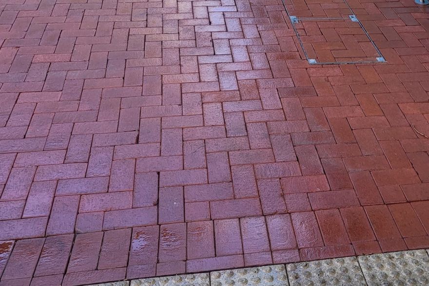 Before and after cleaning on brick pavers: after