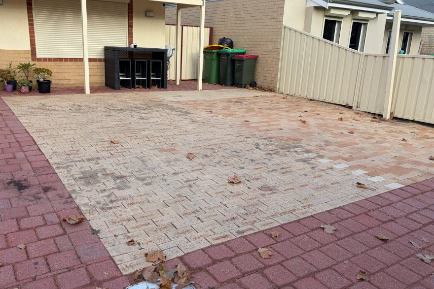 Before and after oil stains on brick pavers · Driveway: before