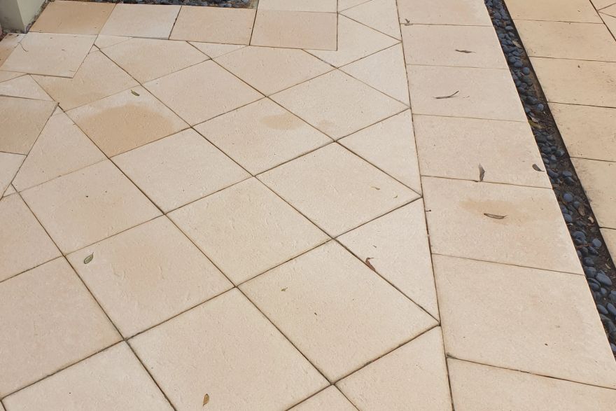 Before and after cleaning on sandstone pavers: after