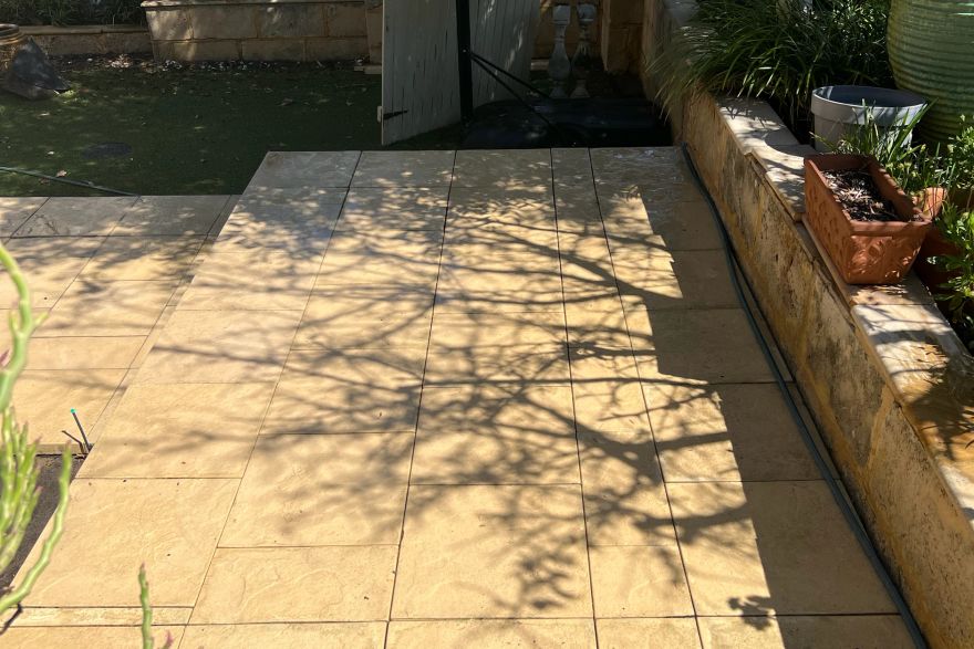 Before and after cleaning on sandstone pavers: after