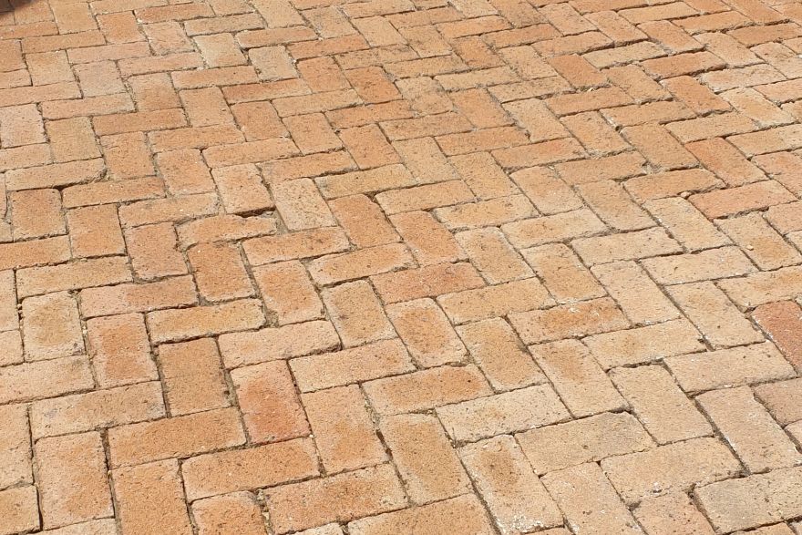 Before and after cleaning on brick pavers: after