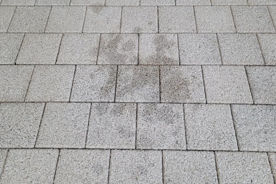 Before and after oil stains on brick pavers: after