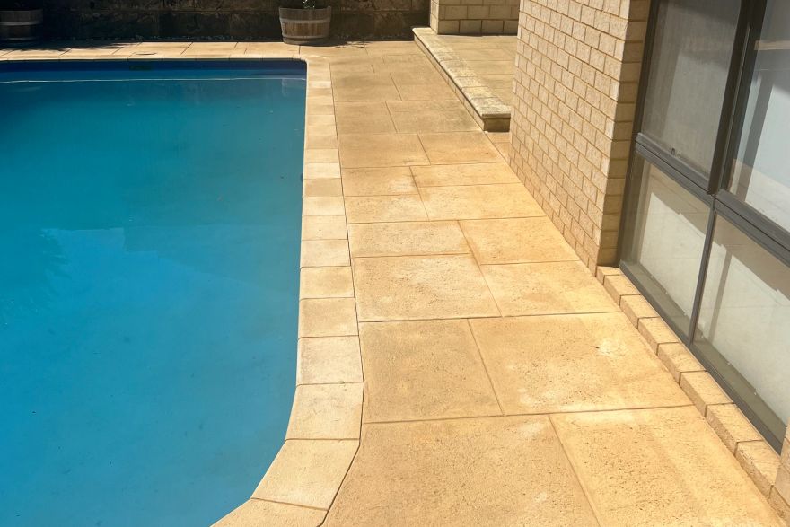 Before and after cleaning on liquid limestone · Poolside: after