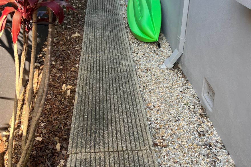 Before and after cleaning on concrete slab: before