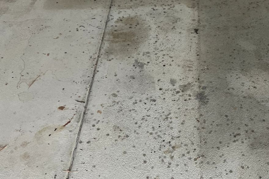 Before and after oil stains on concrete slab · Garage floor: before