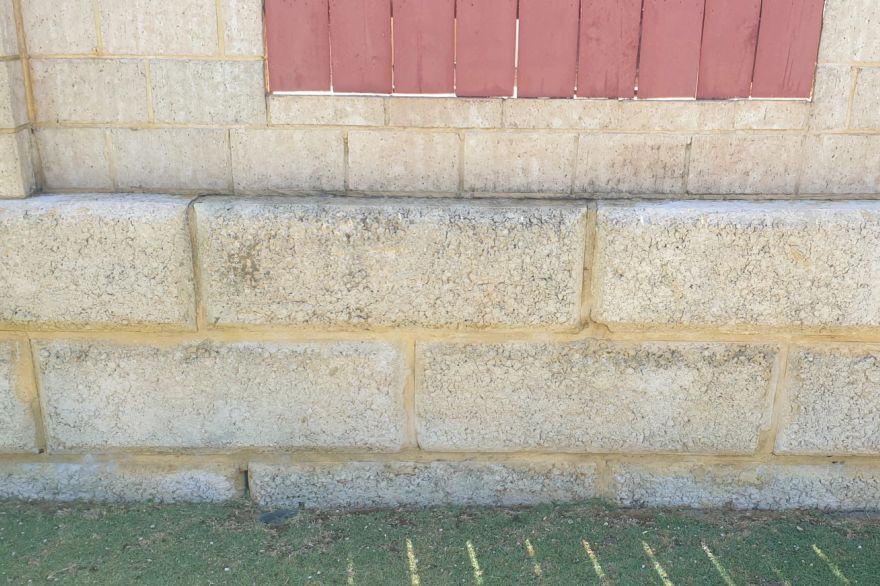 Before and after cleaning on limestone block: after