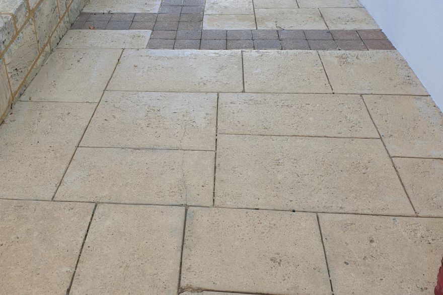 Before and after cleaning on liquid limestone: after