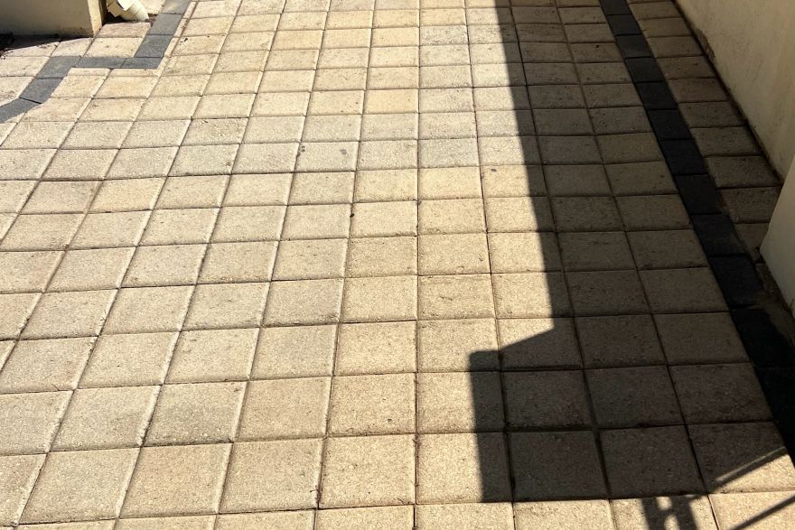 Before and after cleaning on brick pavers: after