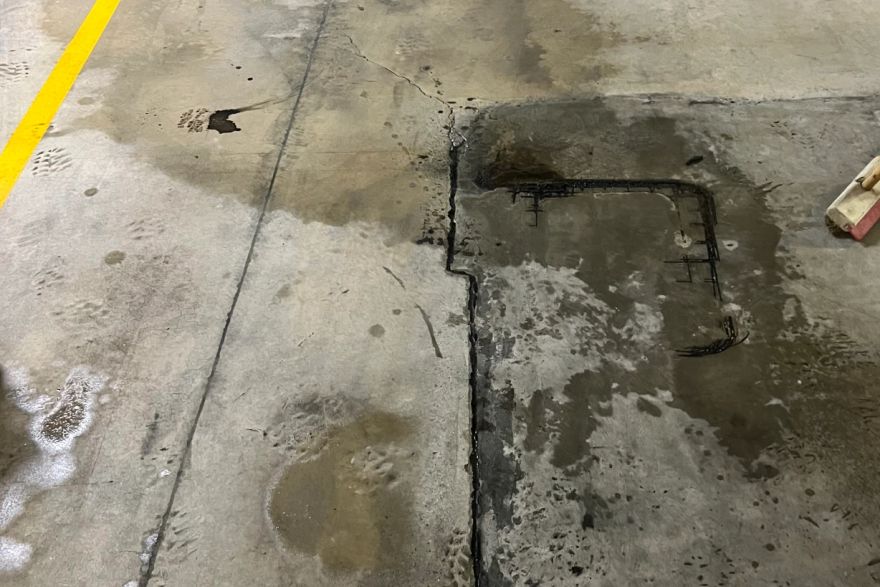 Before and after oil stains on concrete slab: before