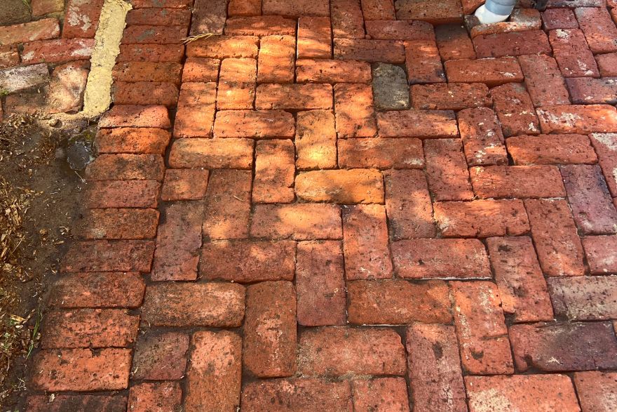 Before and after cleaning on brick pavers: after