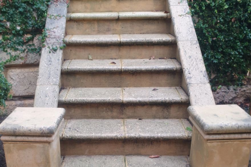 Before and after cleaning on limestone block: before
