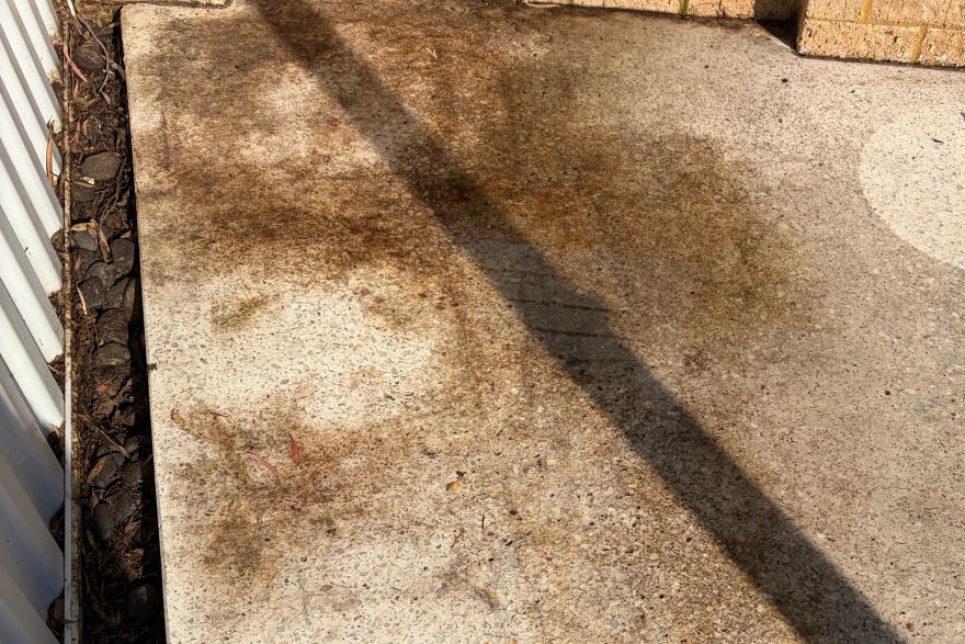 Before and after cleaning on concrete exposed aggregate: before