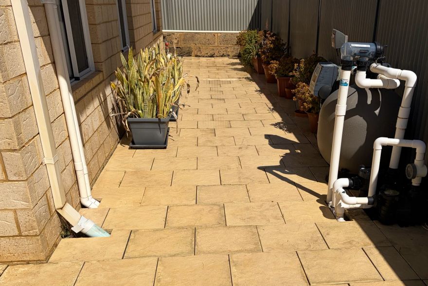 Before and after cleaning on sandstone pavers: after