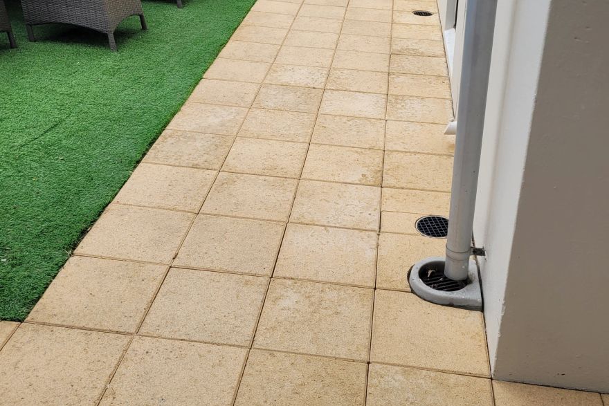 Before and after cleaning on sandstone pavers: after