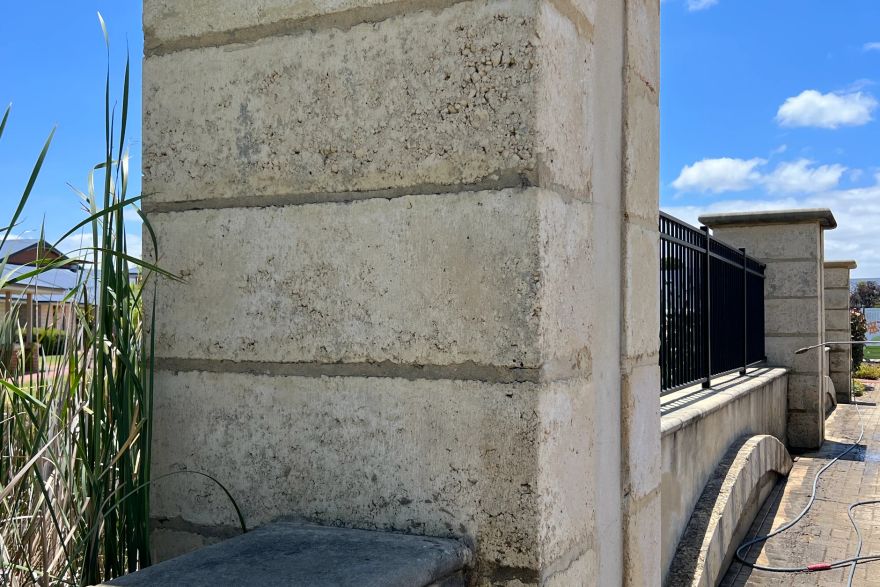 Before and after cleaning on limestone block: before