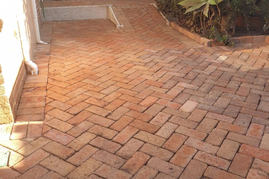 Before and after cleaning on brick pavers: after