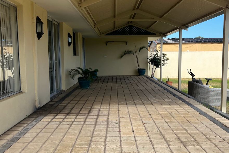 Before and after cleaning on brick pavers: before