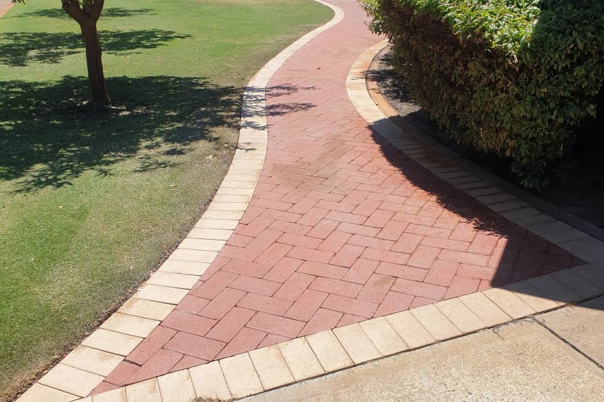 Before and after rust / bore stains on brick pavers: after