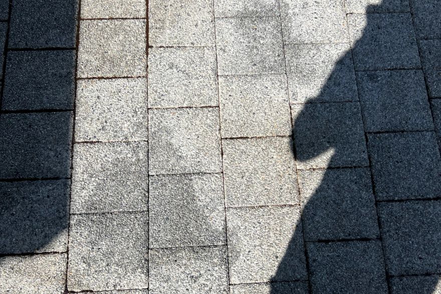 Before and after oil stains on brick pavers: after