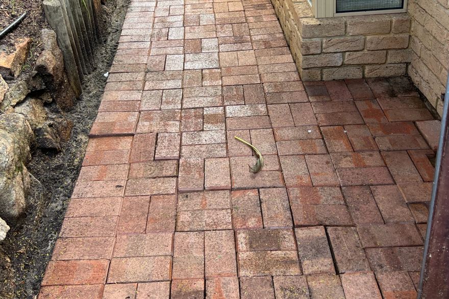 Before and after cleaning on brick pavers: after