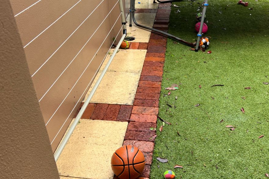 Before and after cleaning on sandstone pavers, brick pavers · Path: after