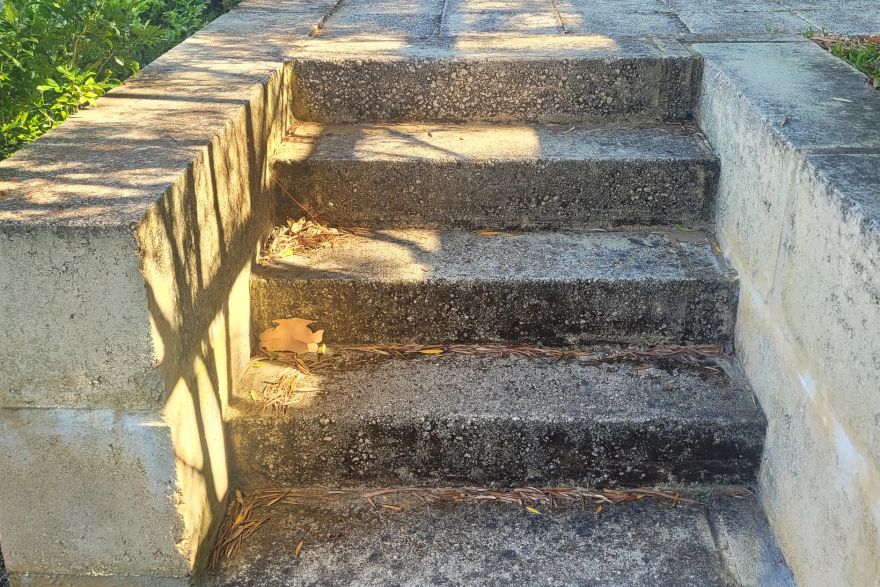 Before and after cleaning on limestone block: before