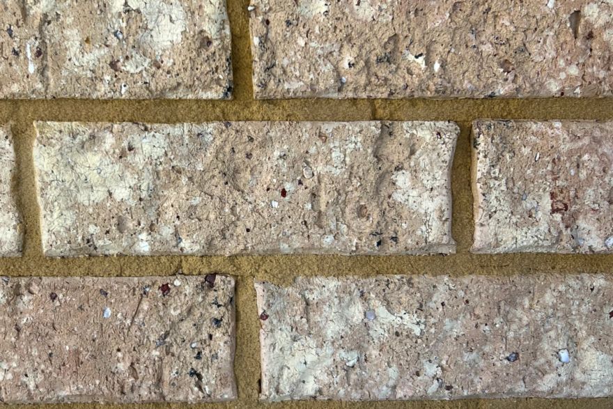Before and after graffiti on house bricks: after