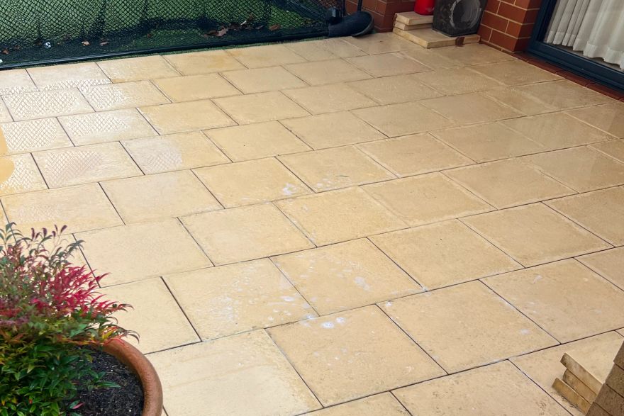 Before and after cleaning on sandstone pavers: after