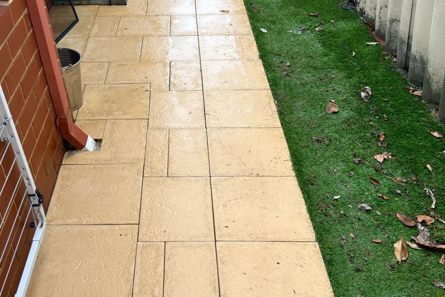 Before and after cleaning on sandstone pavers: after