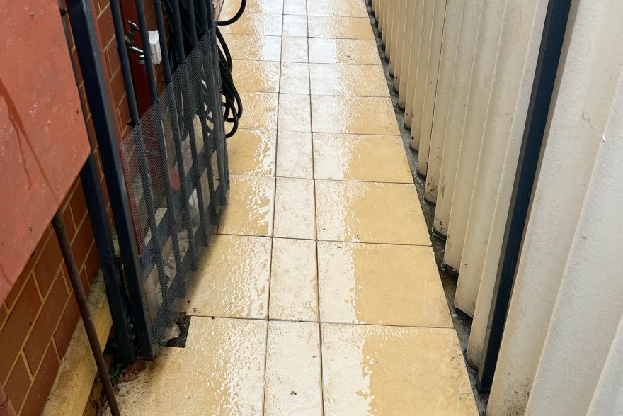 Before and after cleaning on sandstone pavers: after