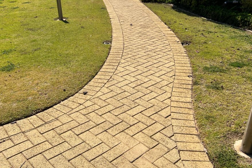 Before and after cleaning on brick pavers: after