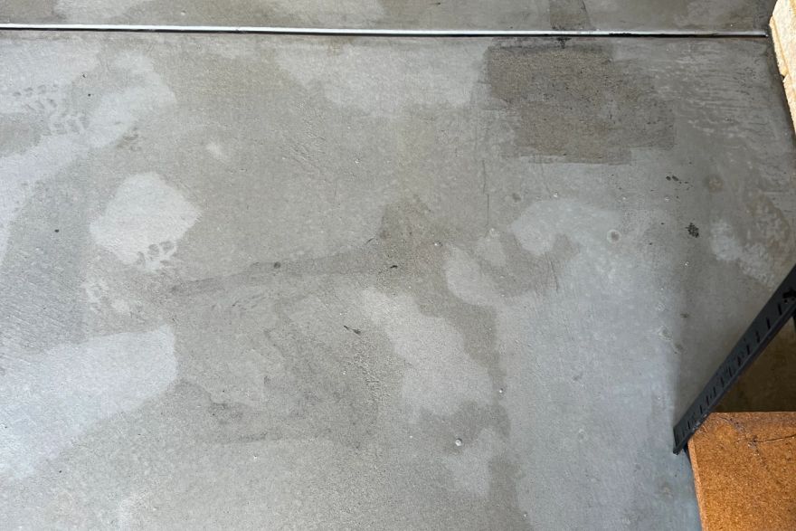 Before and after oil stains on concrete slab · Garage floor: after