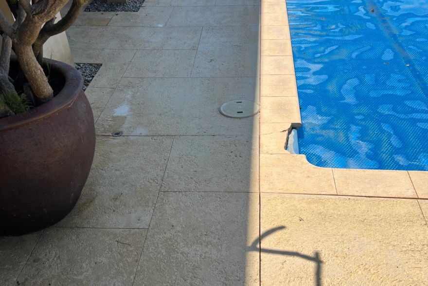 Before and after cleaning on liquid limestone · Poolside: after