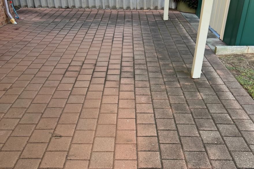 Before and after cleaning on brick pavers: before
