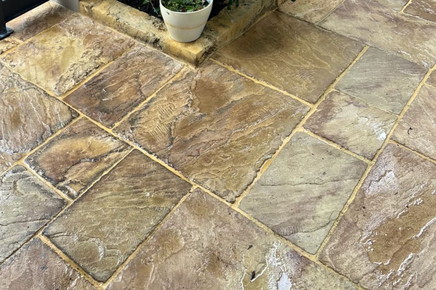 Before and after cleaning on natural stone · Patio / alfresco: after