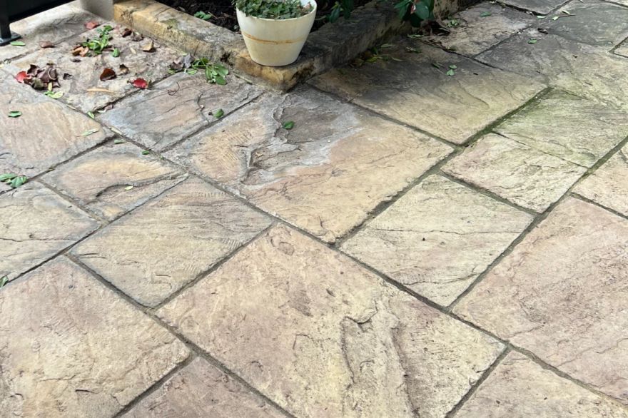 Before and after cleaning on natural stone · Patio / alfresco: before