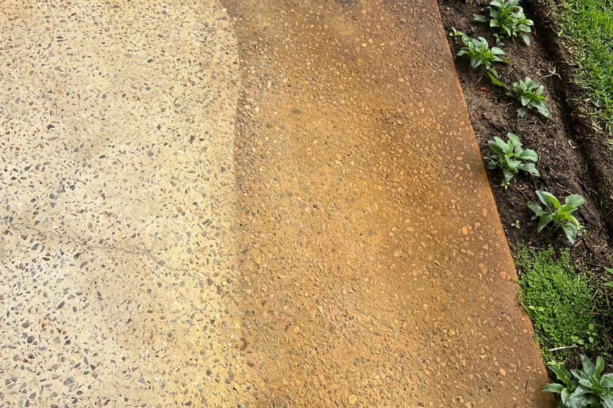 Before and after rust / bore stains on concrete exposed aggregate: before