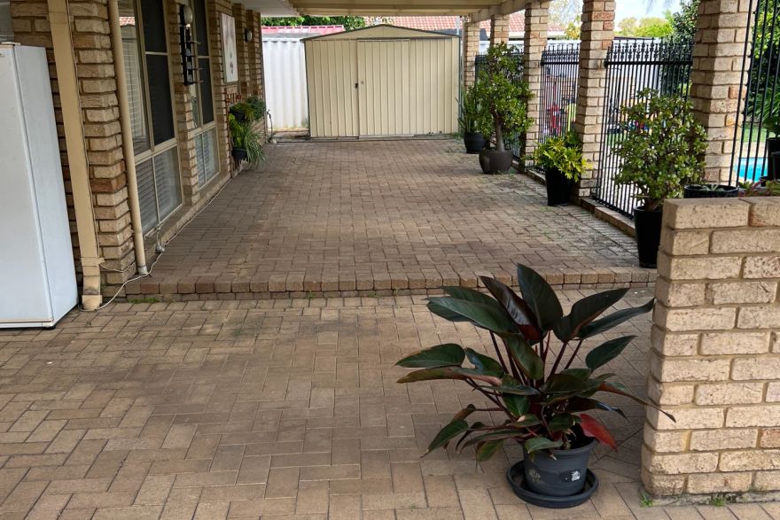 Before and after cleaning on brick pavers · Patio / alfresco: before