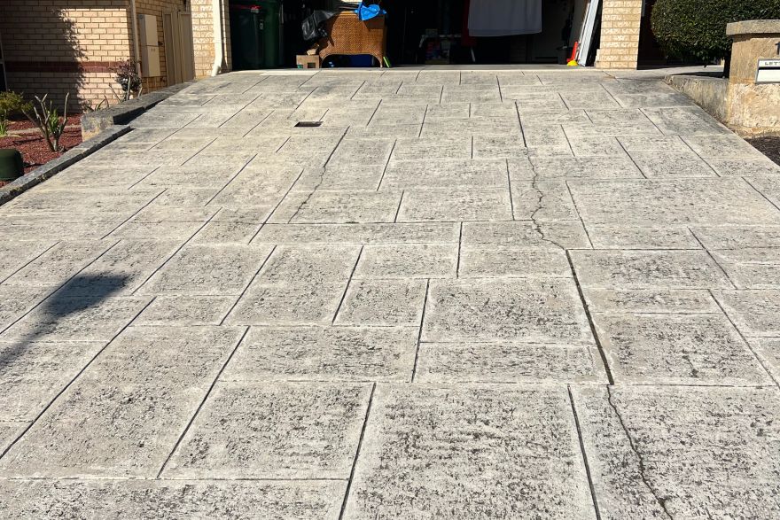 Before and after cleaning on liquid limestone · Driveway: before