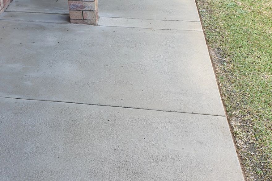Before and after cleaning on concrete slab · Path: after