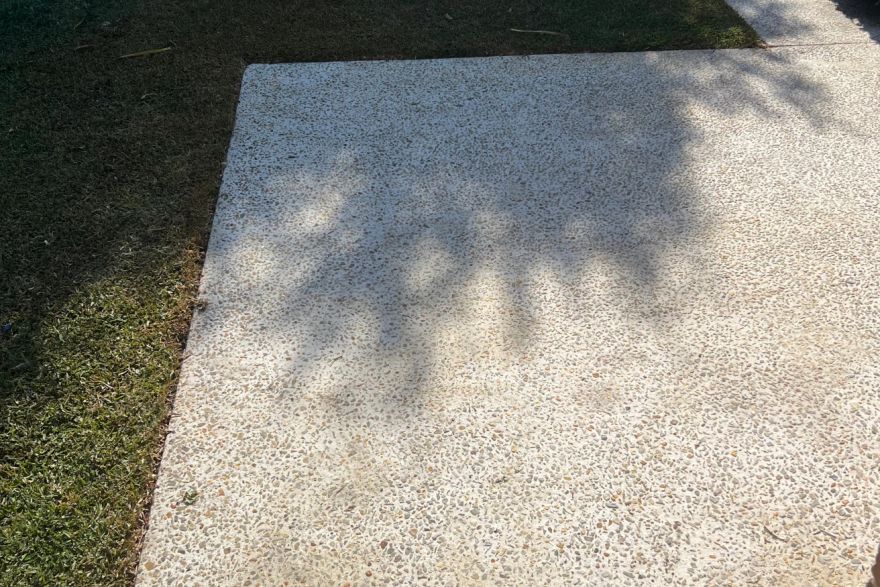 Before and after rust / bore stains on concrete exposed aggregate · Path: after