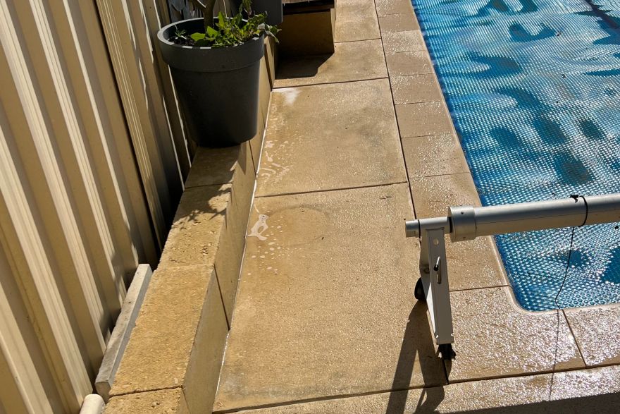 Before and after cleaning on liquid limestone · Poolside: after