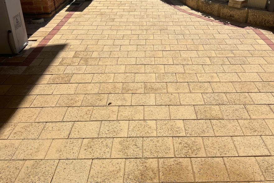 Before and after cleaning on brick pavers · Patio / alfresco: after
