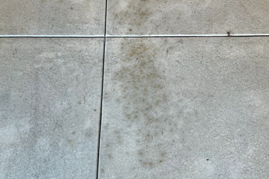 Before and after oil stains on concrete slab · Garage floor: after