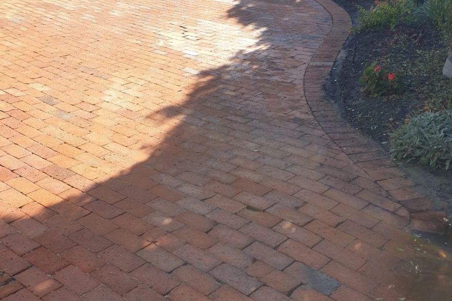 Before and after cleaning on brick pavers: after
