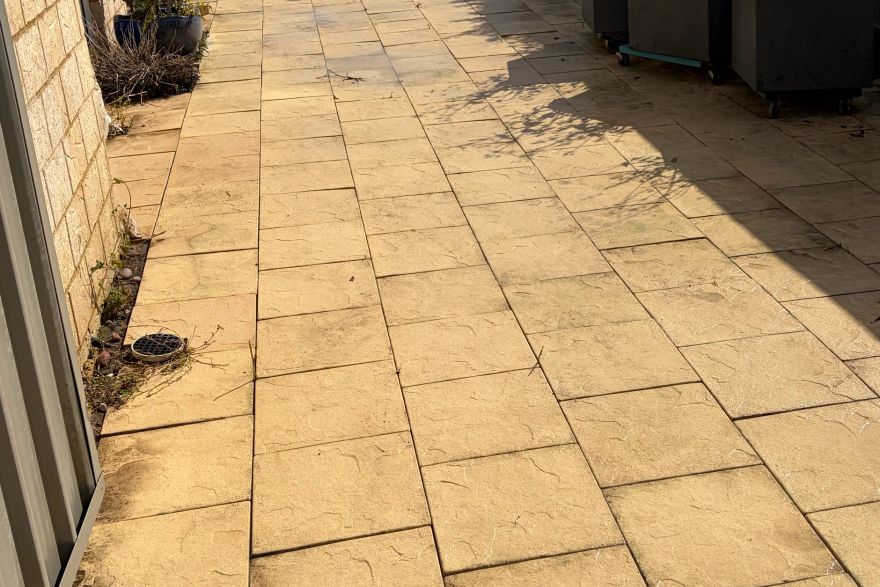 Before and after cleaning on sandstone pavers: after